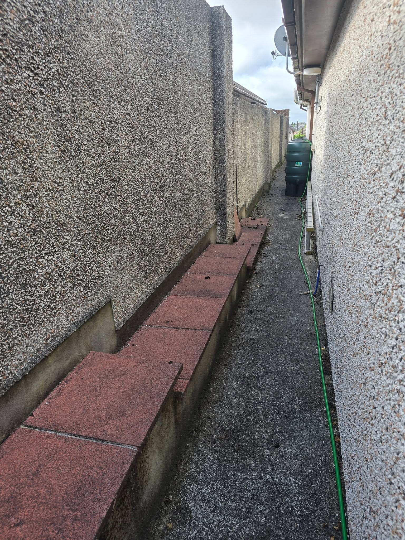 Dirty stained patio before pressure washing